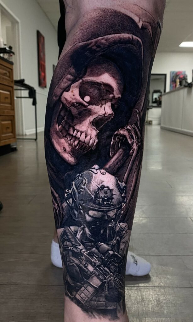 An Artistic Tattoo Depicting a Skull Alongside a Gun