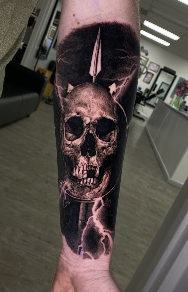 An Intricate Tattoo Design Showcasing a Skull