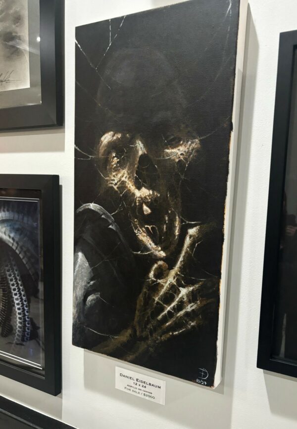 A Museum Display Featuring a Painting of a Skeleton