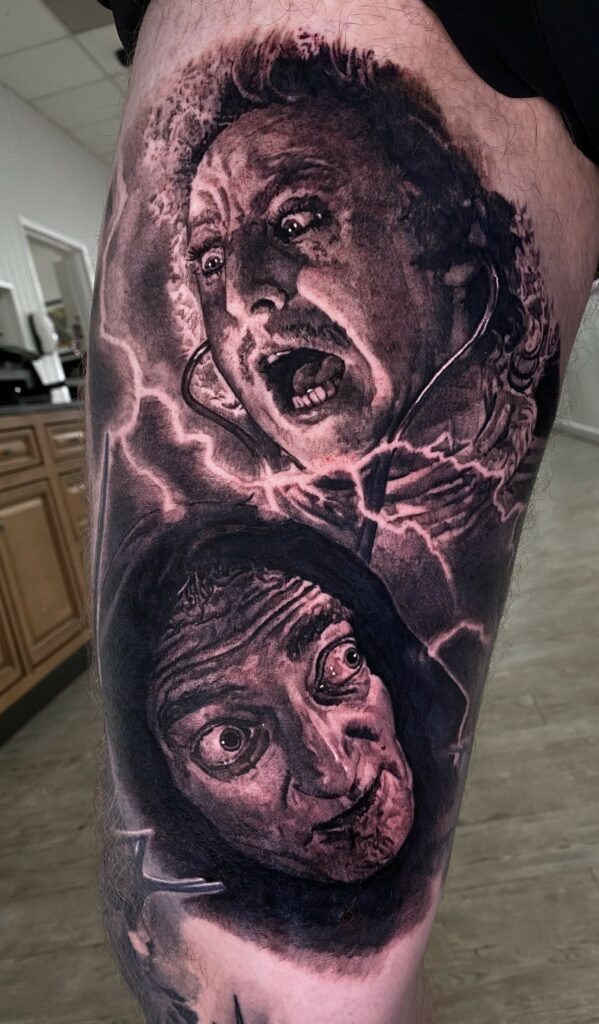 A Thigh Tattoo Featuring a Man’s Face