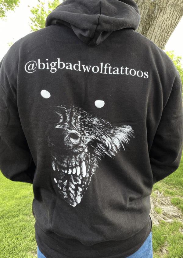 The Back View of a Man in a Hoodie